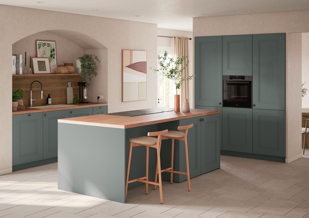 Cuisine Vanden Borre Kitchen vert sauge avec îlot central et plan de travail en bois